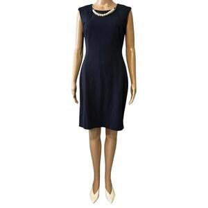 Elegant Black Dress with Pearl Accents